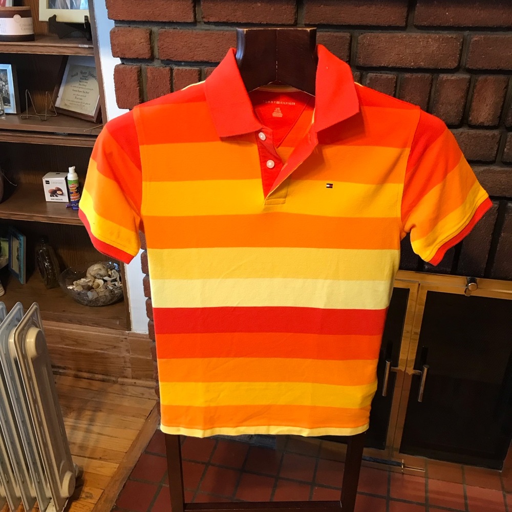 Never used Tommy Hilfiger polo size L in boys or S in men